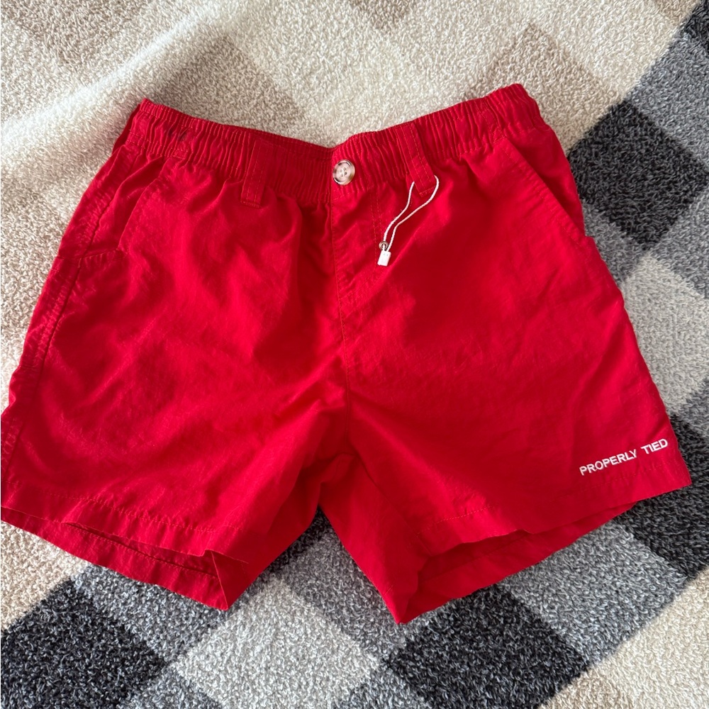 Properly tied boy shots